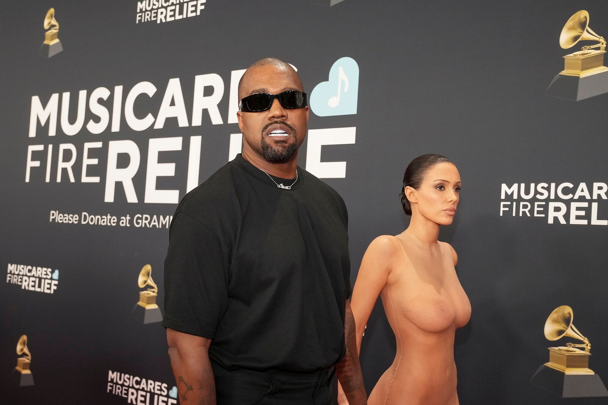Kanye West gets romantic with Bianca Censori to respond to criticism of invisible dress at Grammys