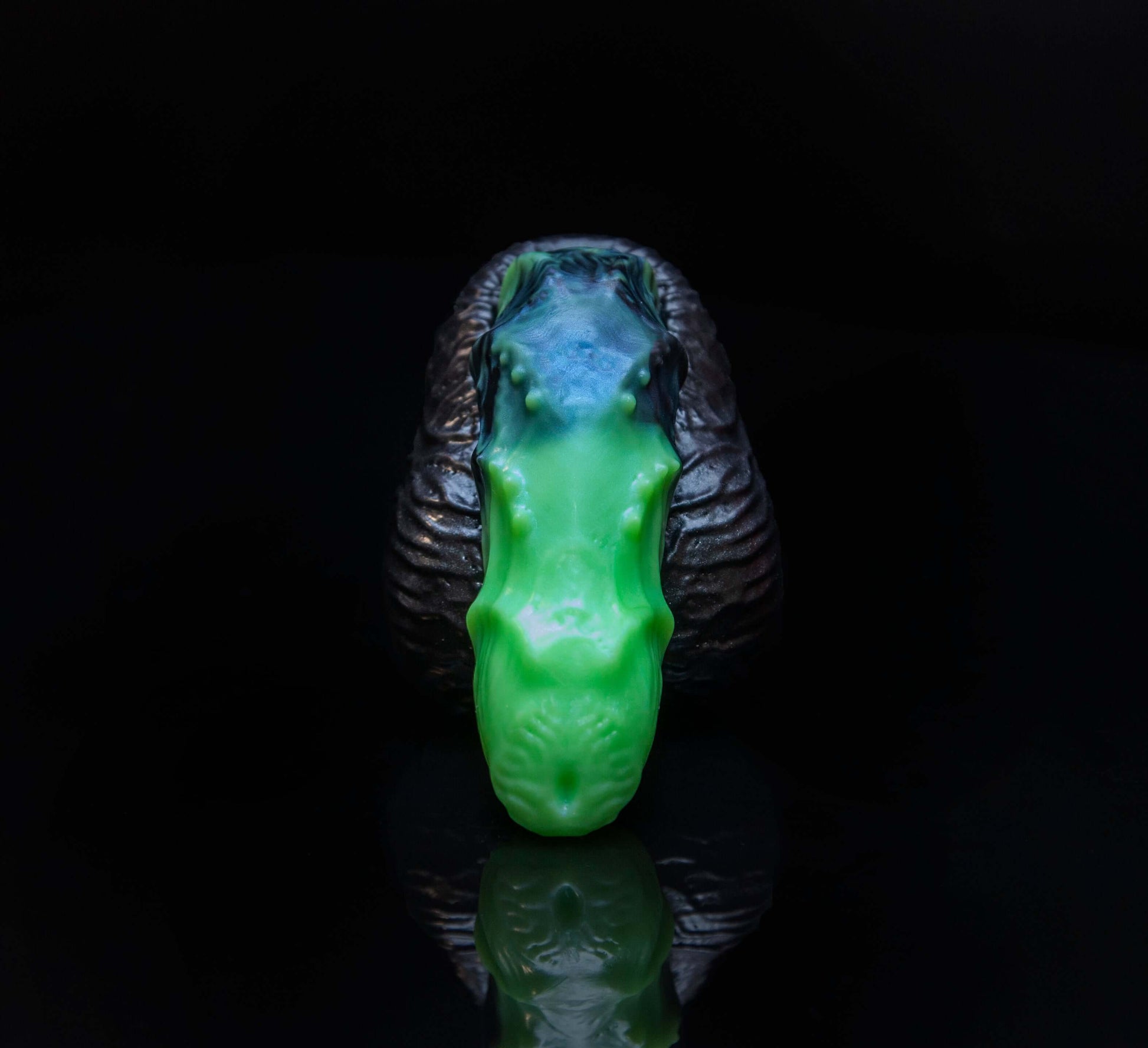 Antarei The Alien Packer with a green and black design against a black backdrop