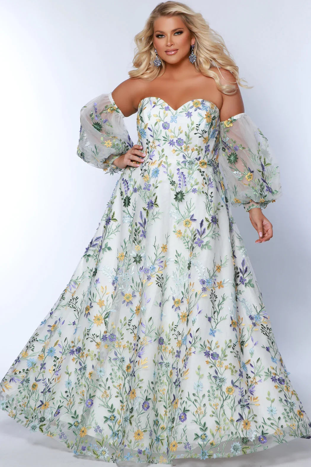 This Sydneys Closet SC7381 long prom dress is perfect for formal occasions or special evenings out. Featuring a plus size A-line silhouette, a sweetheart neckline, and a striking floral pattern, this stylish dress is sure to bring a touch of elegance and glamour to your look. Unleash your romantic side in our 'Watch Me Bloom' formal dress!