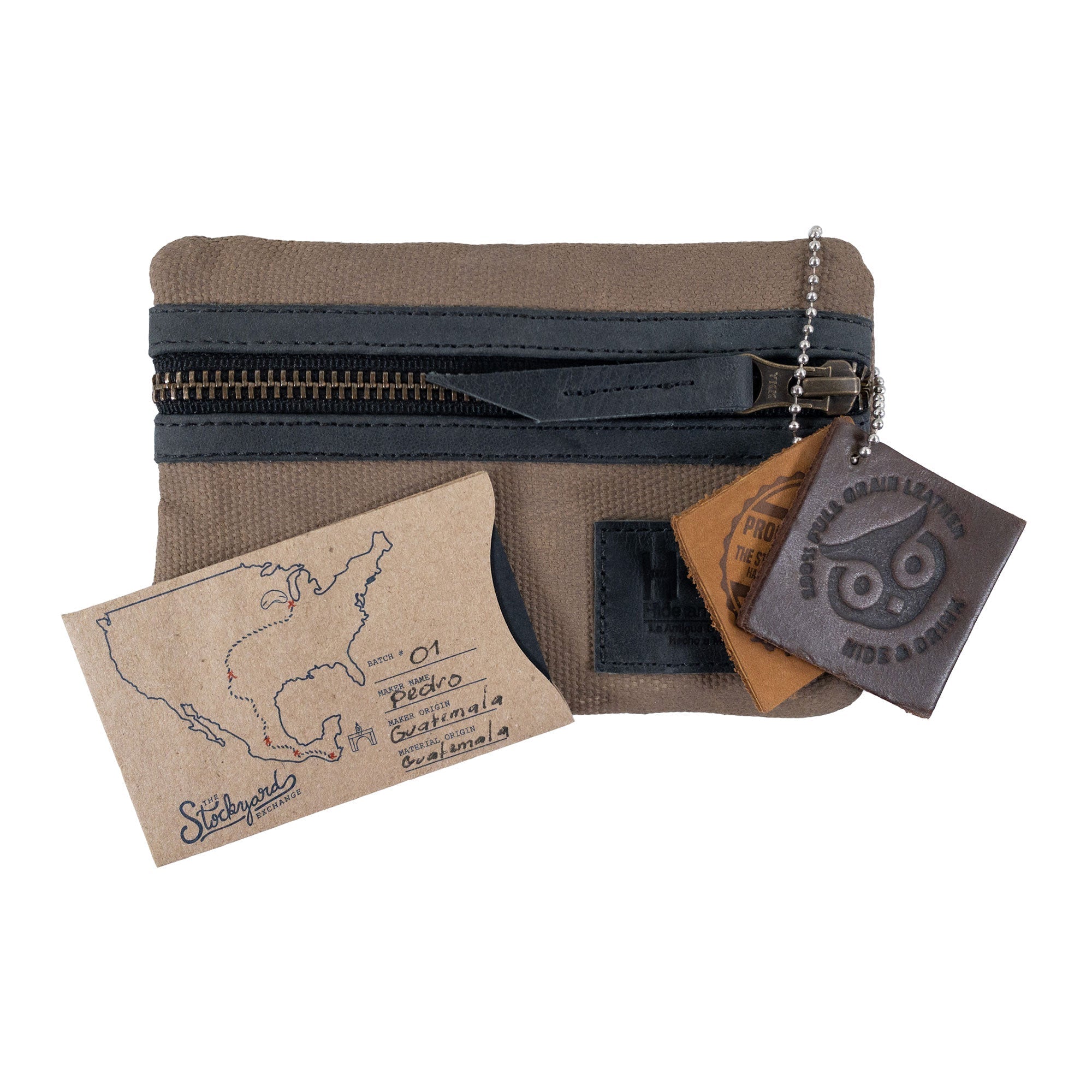 Packaging of the khaki Multi-tool Pocket Pouch by Hide & Drink, highlighting artisan production and quality craftsmanship with tags.