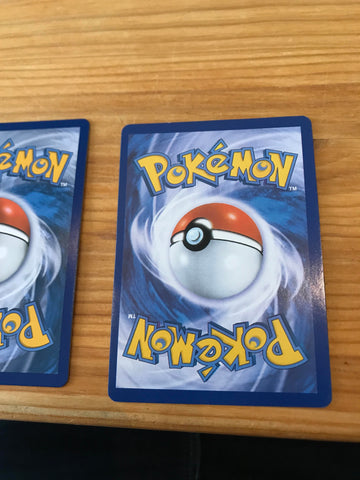 Fake or real? I don't know. The backside is slightly lighter and off center than your average card, but the front looks very legit. I've had it for a long time. Advice?