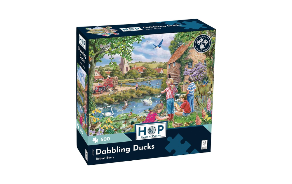 House of Puzzles 500 Piece Dabbling Ducks Jigsaw Puzzle featuring children by a pond and ducks
